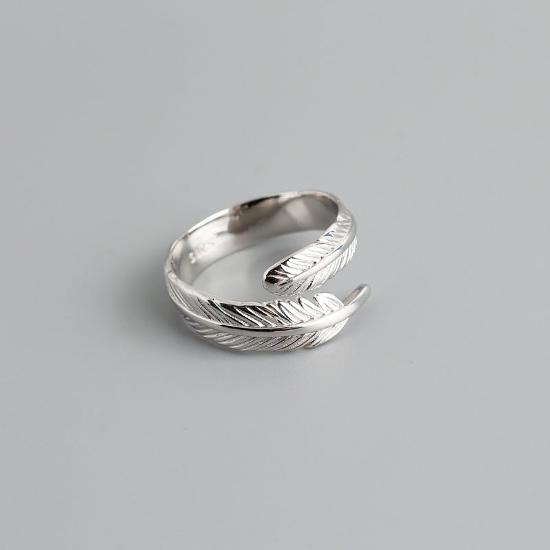 Adjustable Golden Plume Ring